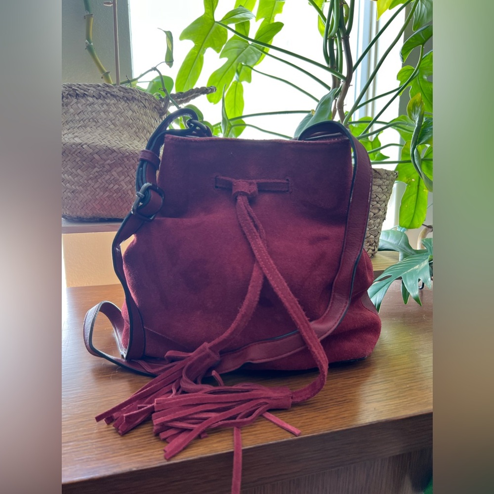 ModCloth red suede and leather crossbody bucket bag